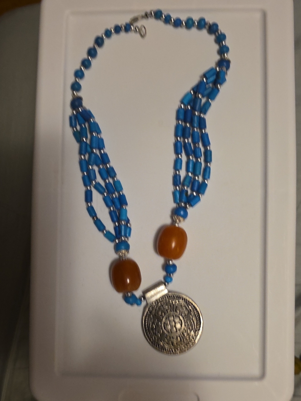 Blue Beaded Necklace with Amber Accents and Silver Medallion